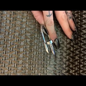 Stainless sleek nail bracelet